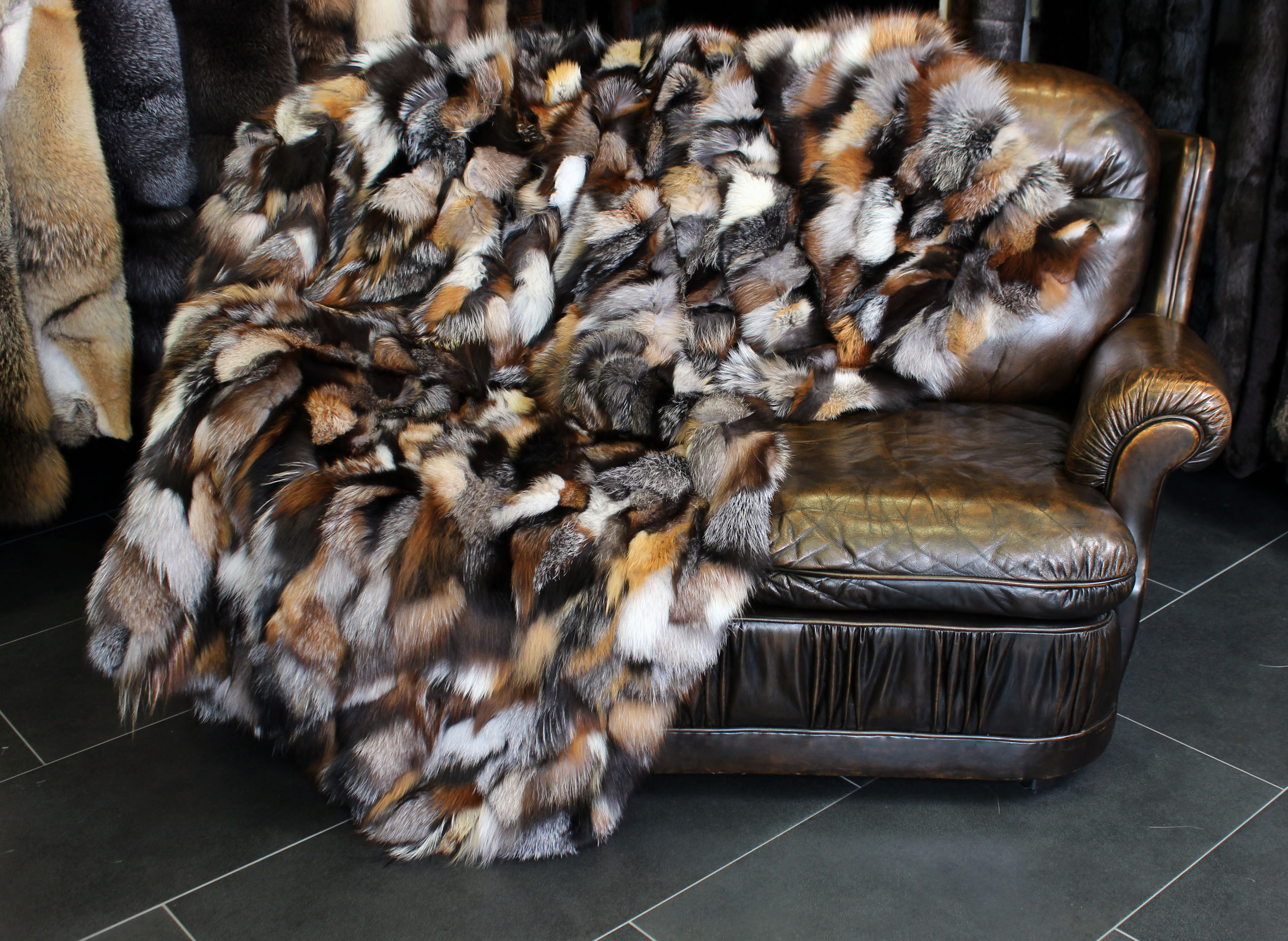 Snug Fox Pieces Fur Blanket in various natural tones