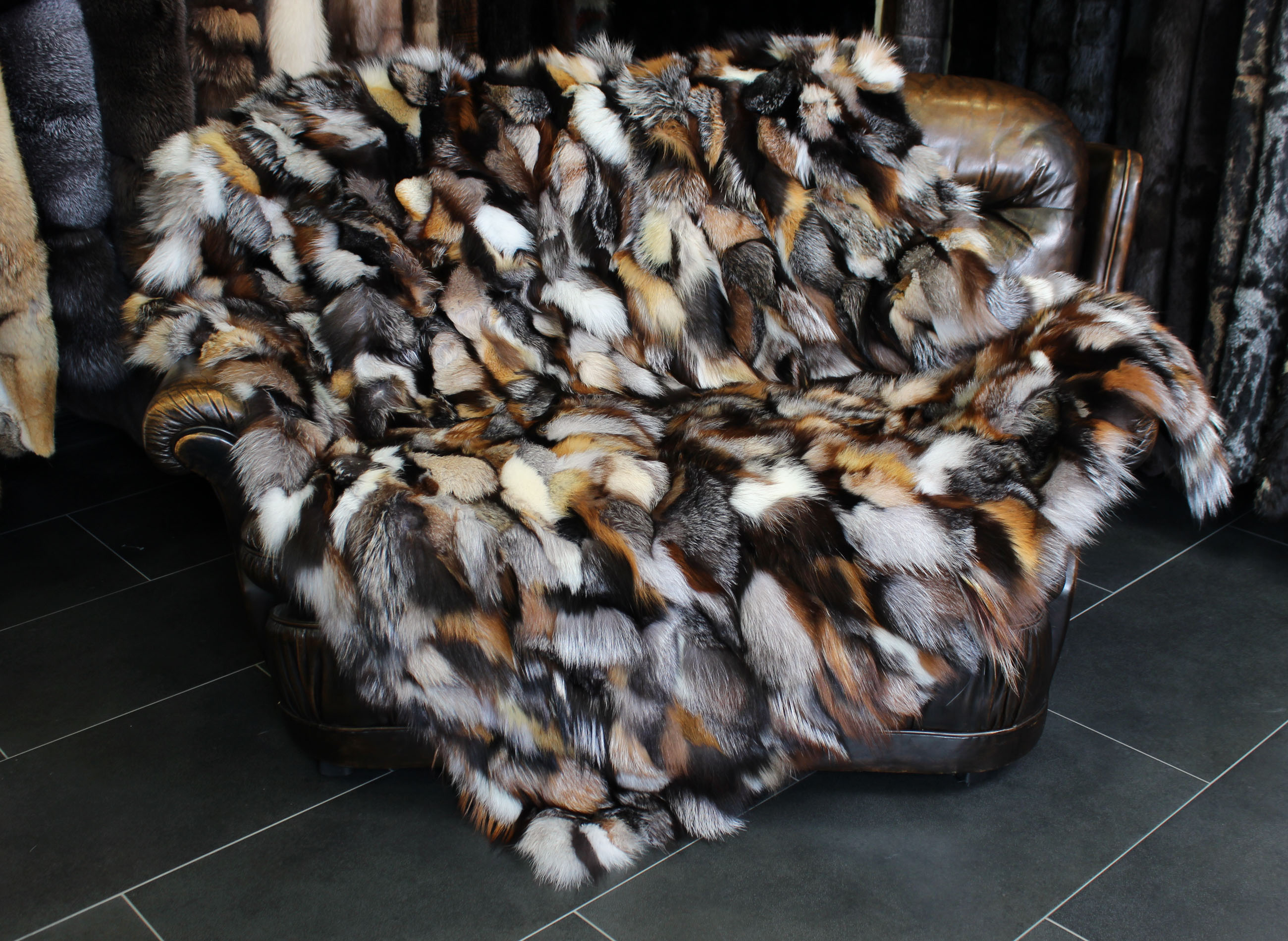 Snug Fox Pieces Fur Blanket in various natural tones