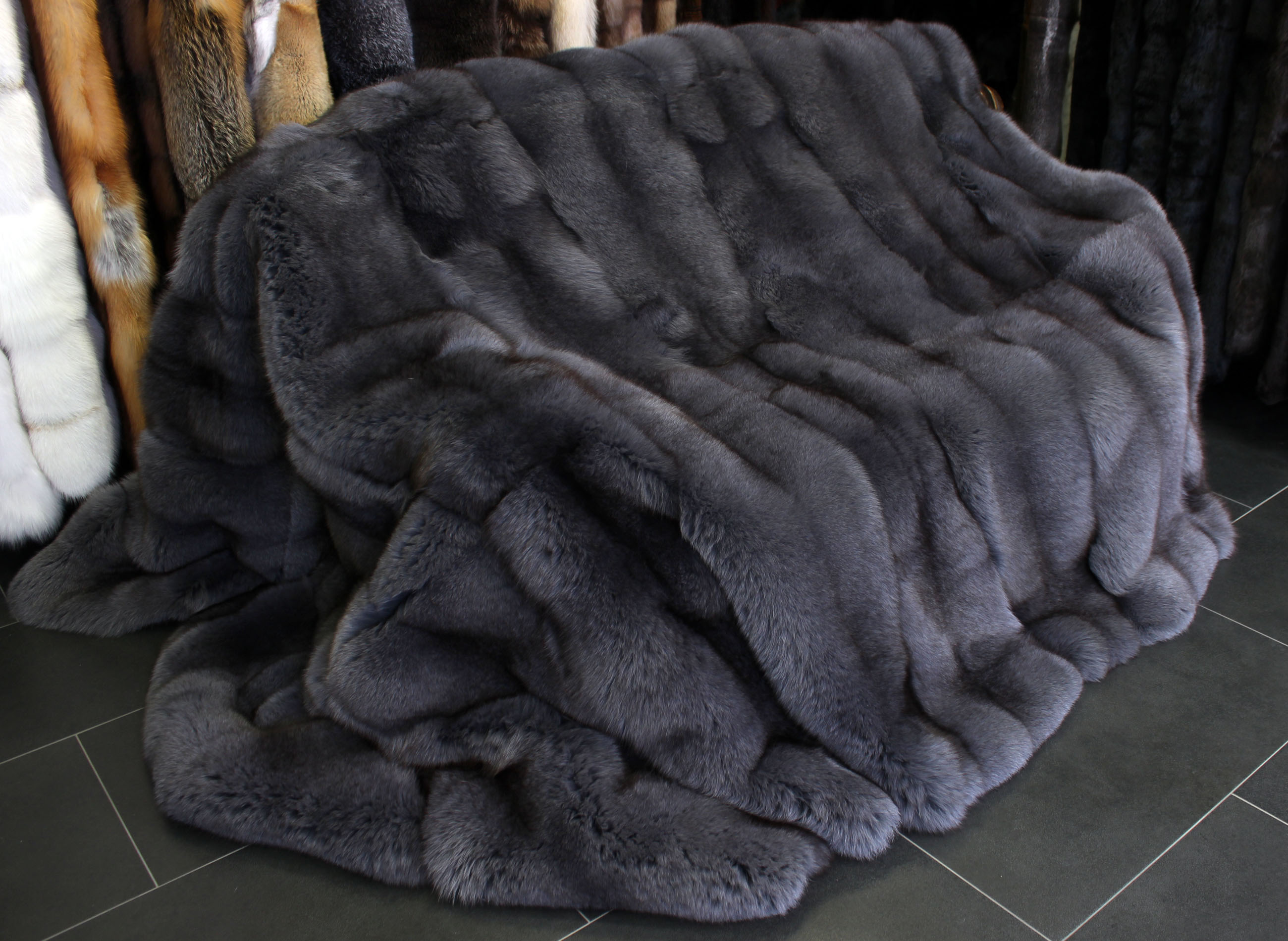 Snuggly Blue Fox Fur Blanket in graphite grey