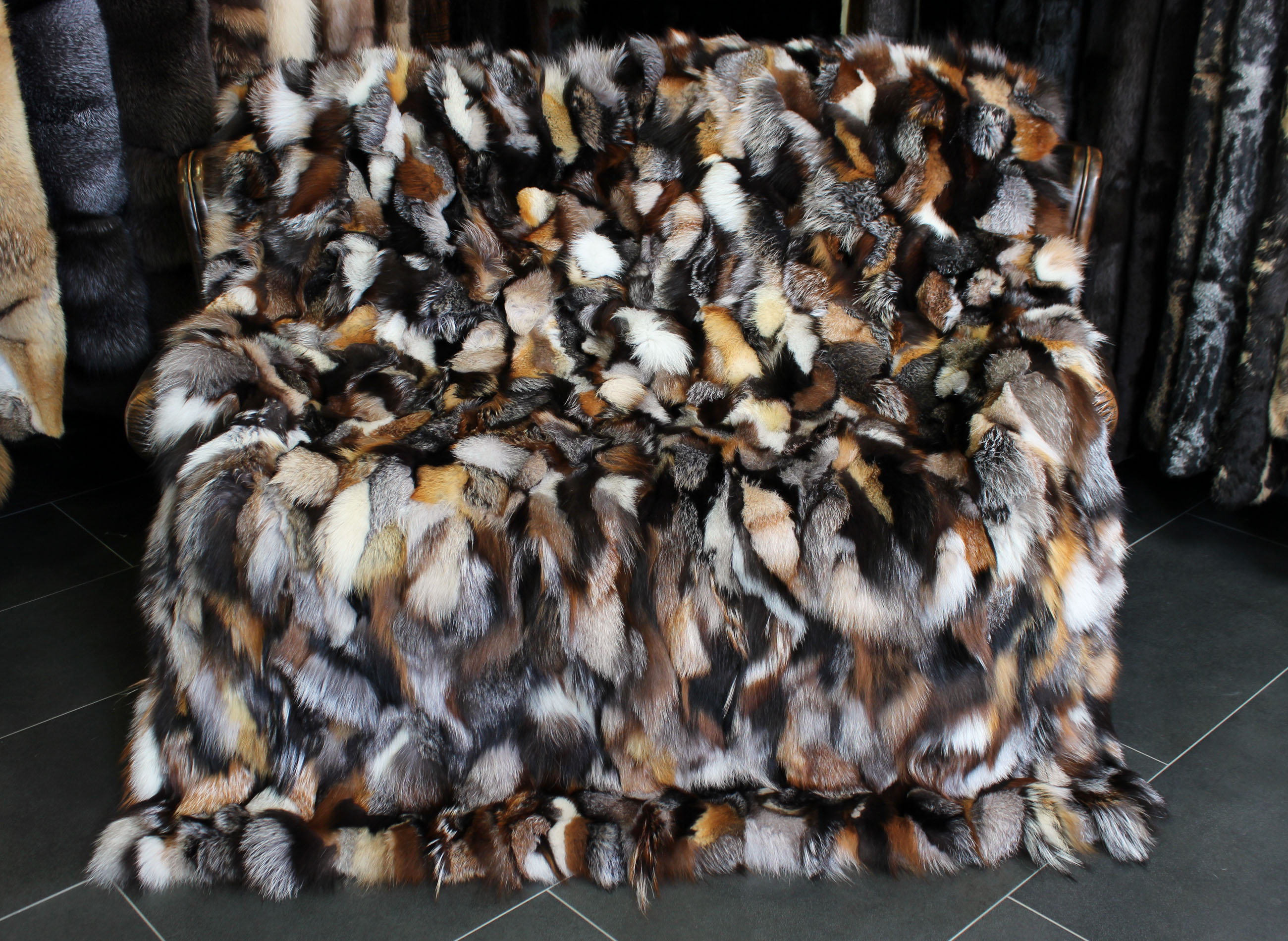 Snug Fox Pieces Fur Blanket in various natural tones