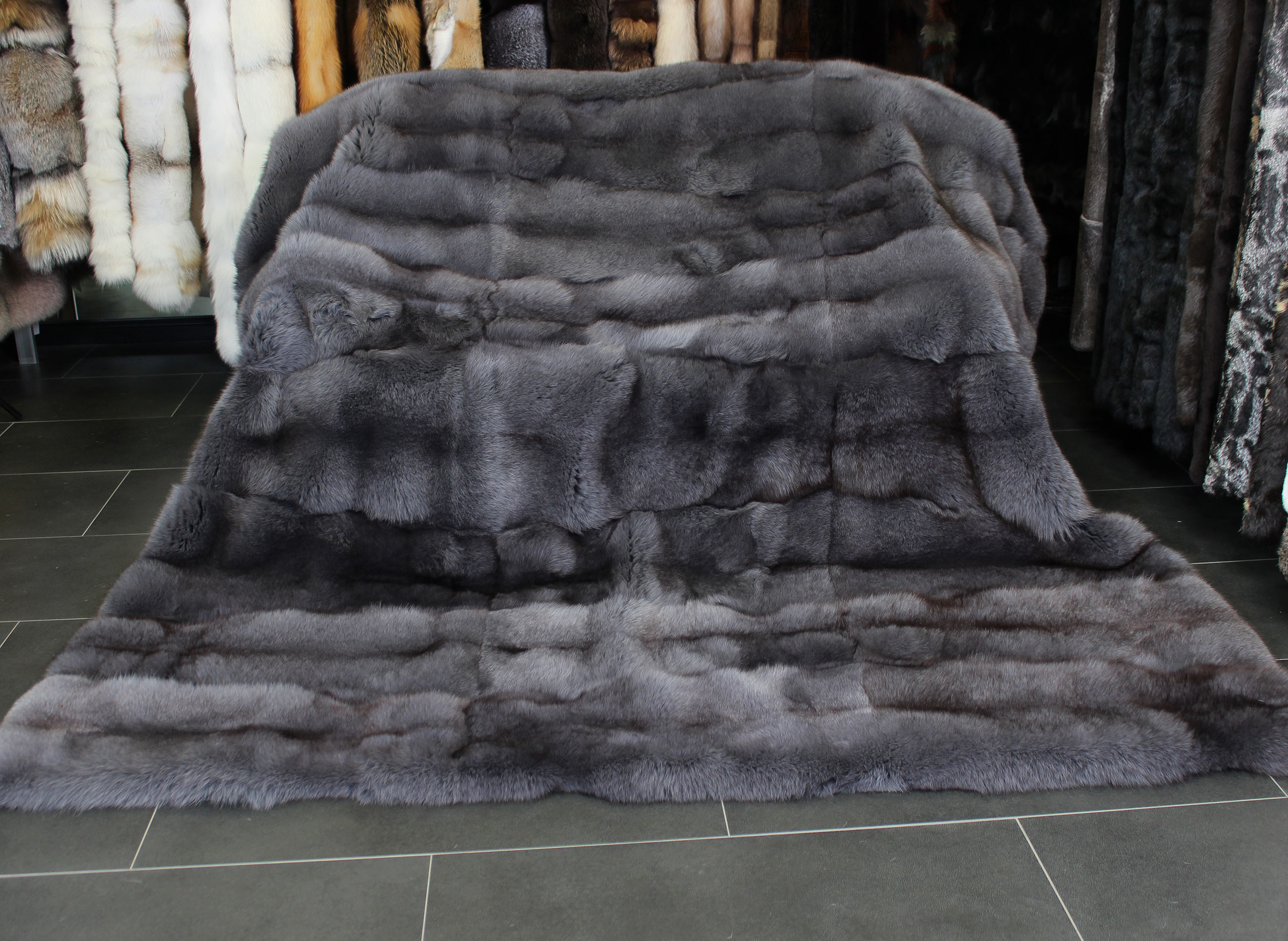 Snuggly Blue Fox Fur Blanket in graphite grey