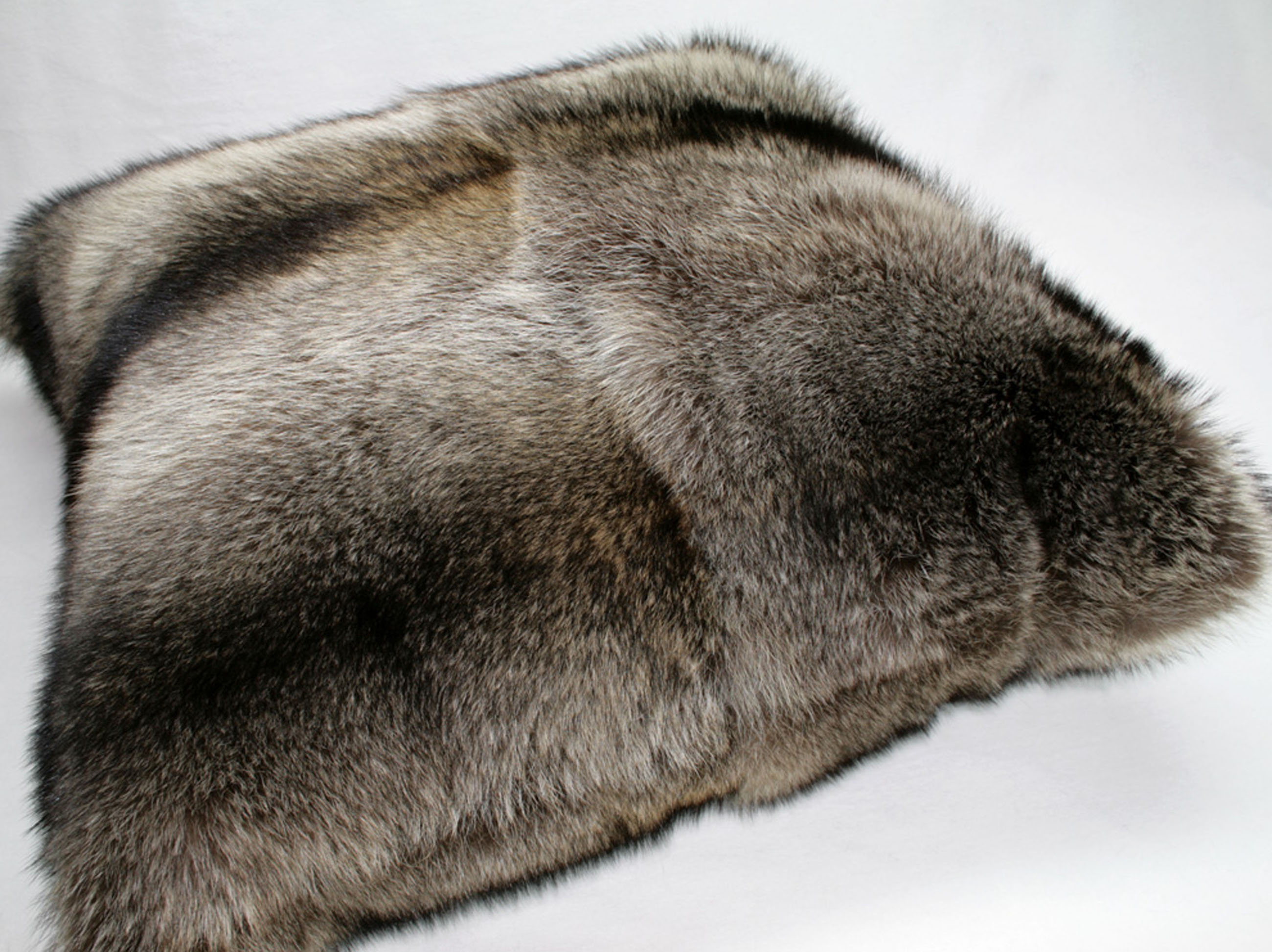 Fur pillow made from raccoon furs, fur on both sides