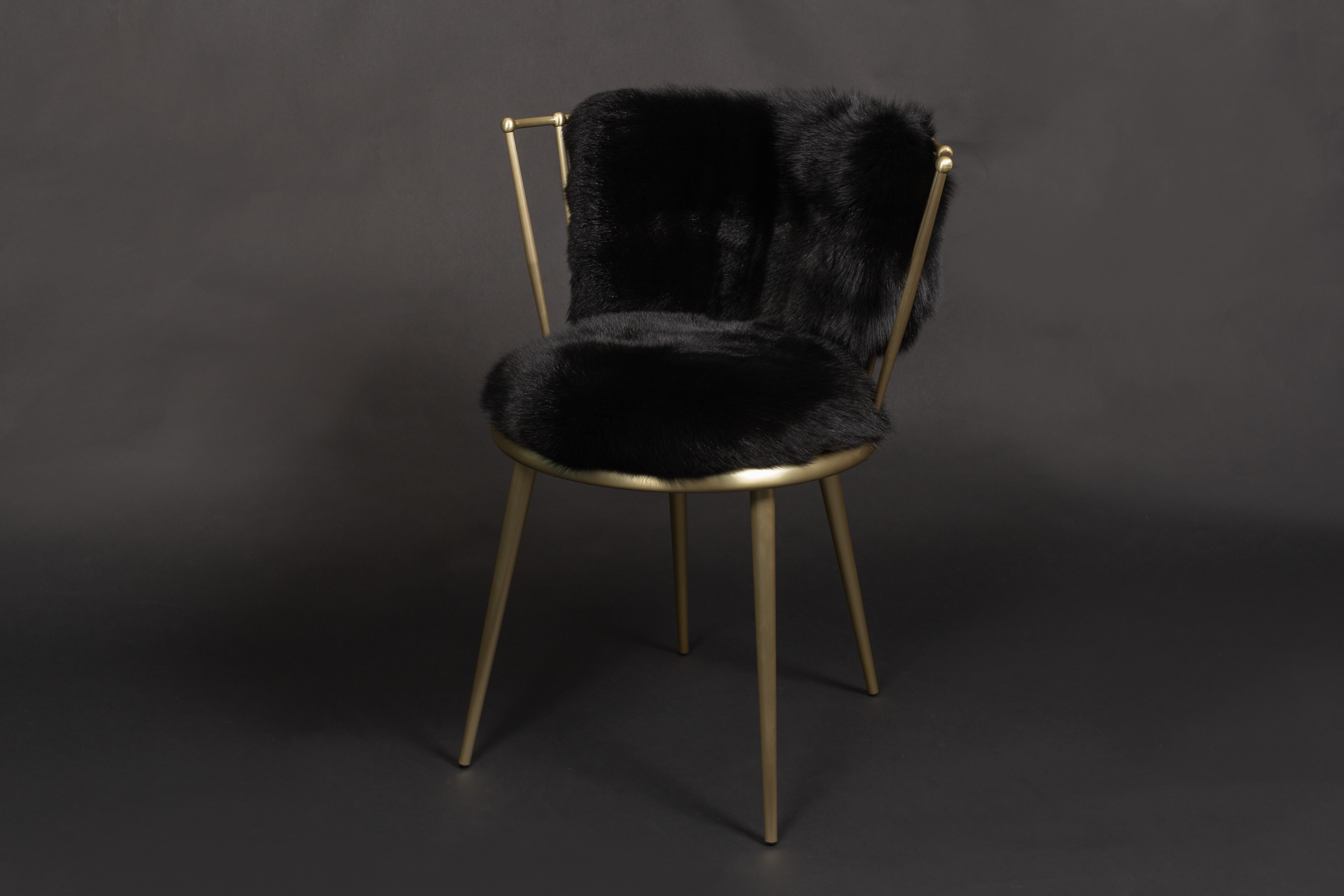 Scandinavian Shadow Fox Chair in black-gold