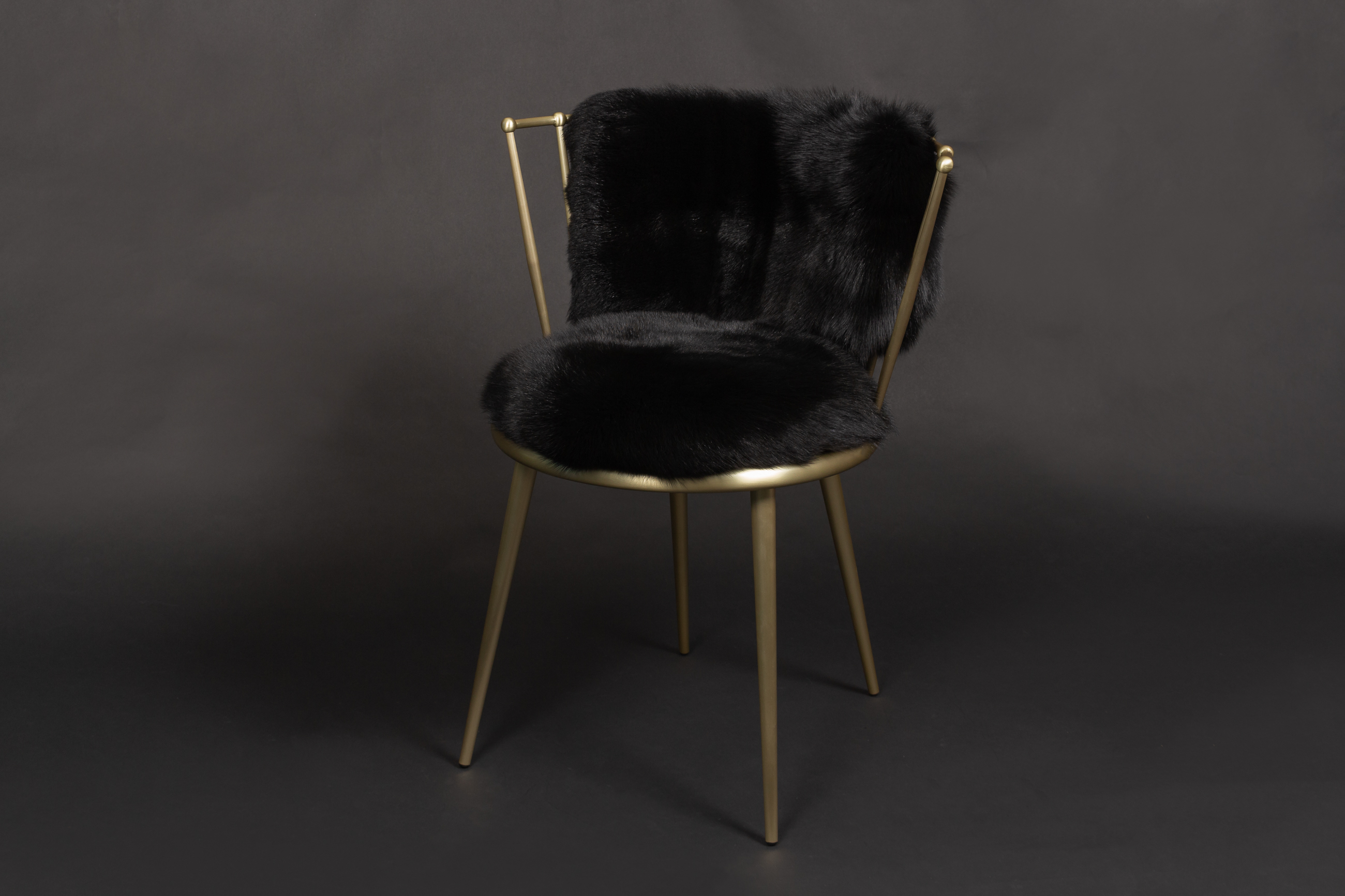 Scandinavian Shadow Fox Chair in black-gold