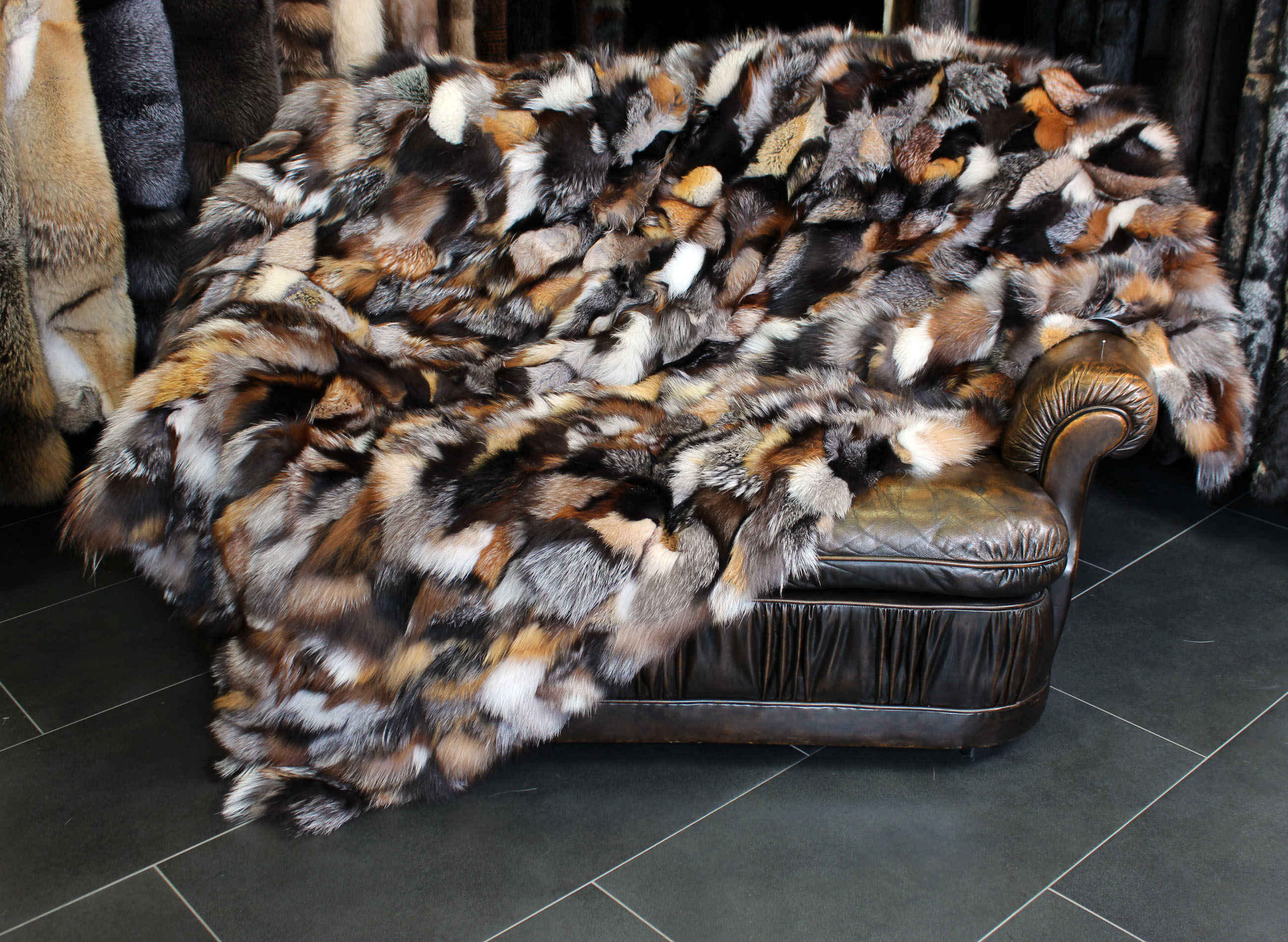Snug Fox Pieces Fur Blanket in various natural tones