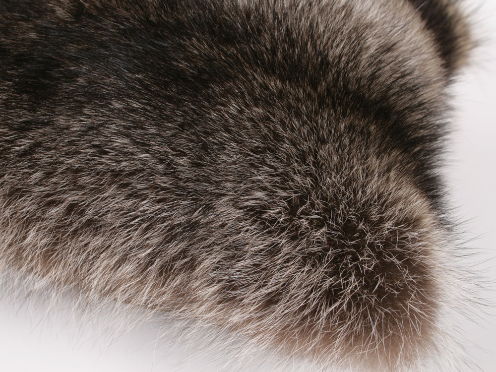 Raccoon fur pillow