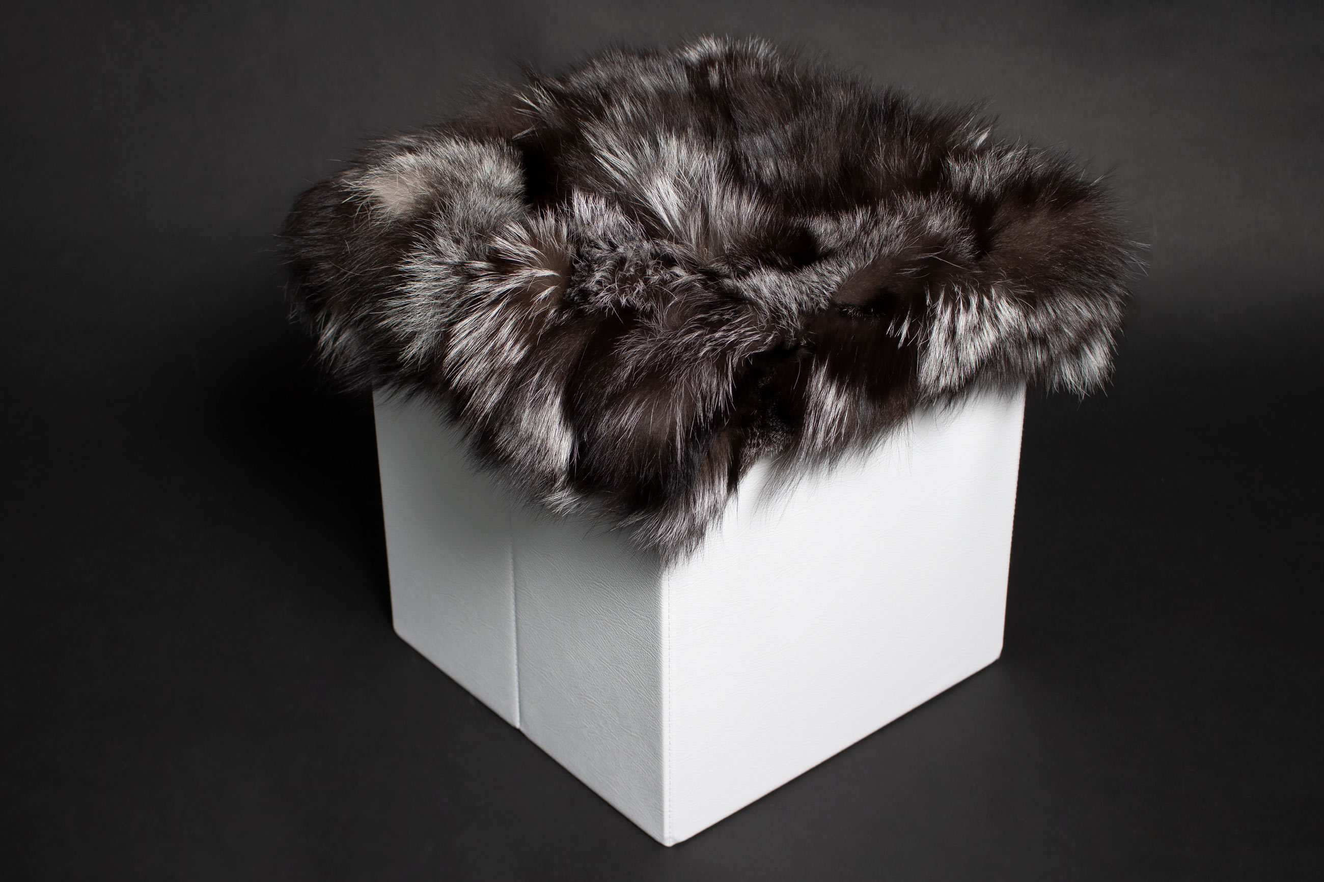 2-4593-Sitzwuerfel-Silberfuchs-Stuecken-Lars-Paustian Foot Stool made with Genuine Silver Fox Fur