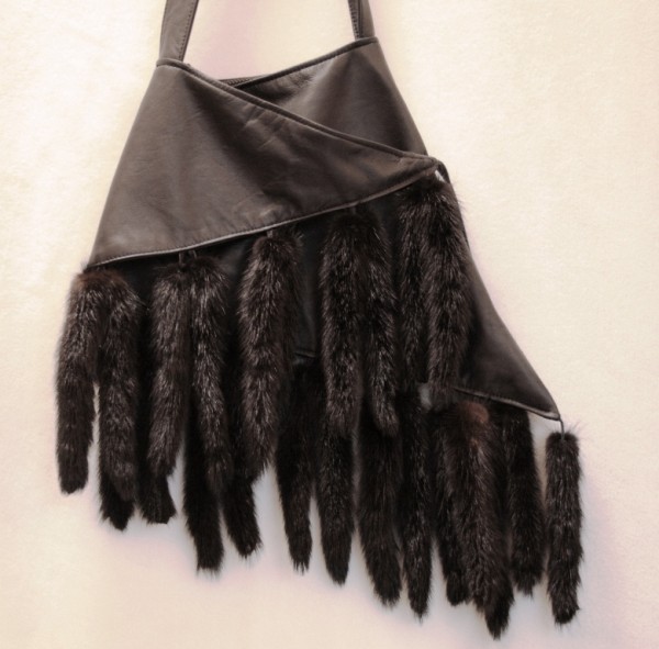 Luxurious fur handbag made from black nappa leather and mink tails